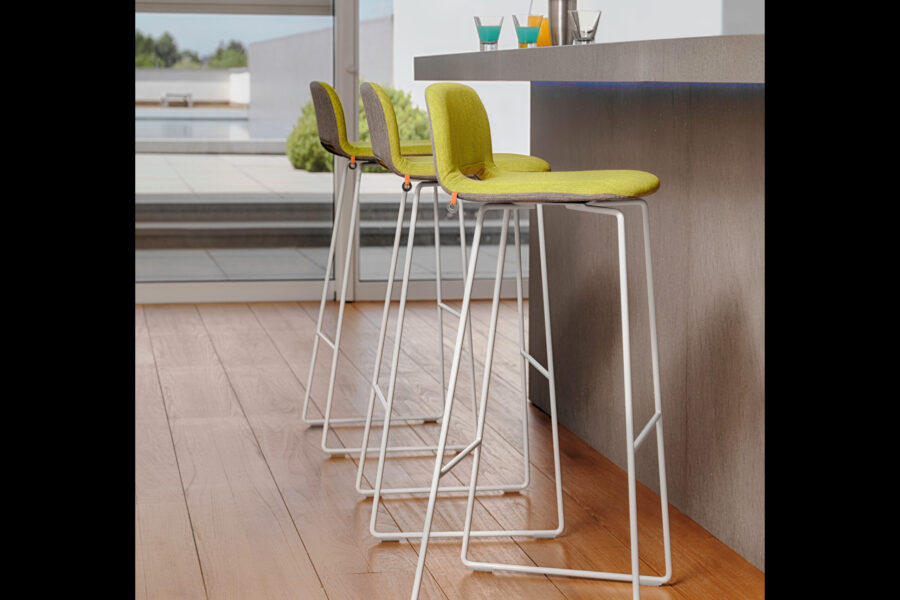 PAMP bar stool. Upholstered / steel legs. Very large choice of fabrics / colors.